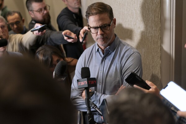 Toronto Blue Jays general manager Ross Atkins responds to questions during a news conference at the Major League Baseball winter meetings Tuesday, Dec. 5, 2023, in Nashville, Tenn. (AP Photo/George Walker IV)