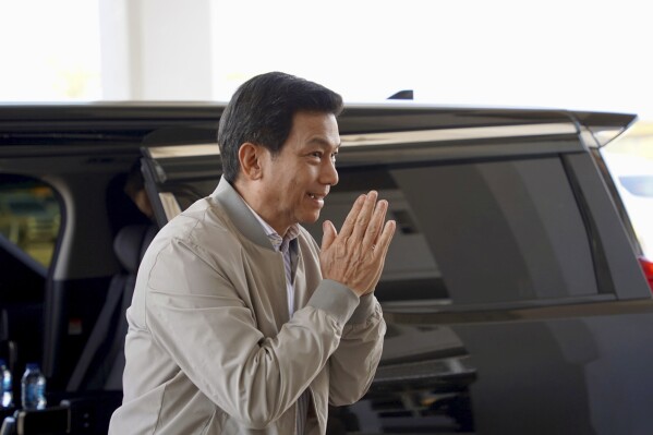 Thailand's Foreign Minister Parnpree Bahiddha-Nukara inspects a customs checkpoint near the border with Myanmar, in Mae Sot, Thailand on Thursday, Feb. 8, 2024. Parnpree was inspecting the area, which will be a staging point for sending cross-border humanitarian assistance to war-wracked Myanmar, which he said would begin in about a month. (AP Photo/Jintamas Saksornchai)