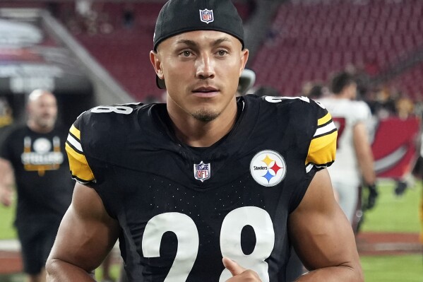 FILE - Pittsburgh Steelers safety Miles Killebrew jogs off the field the field following an NFL preseason football game against the Tampa Bay Buccaneers, Aug. 11, 2023, in Tampa, Fla. The Steelers signed Killebrew, an All-Pro as a special teamer last season, to a two-year deal Monday, March 18, 2024. (AP Photo/Peter Joneleit, File)