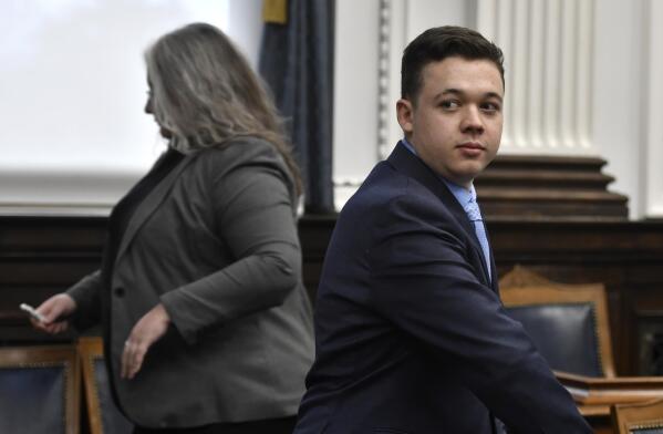 Kyle Rittenhouse, right, looks on as the jury is let out of the room during a break during his trail at the Kenosha County Courthouse in Kenosha, Wis., on Monday, Nov. 15, 2021.  Rittenhouse is accused of killing two people and wounding a third during a protest over police brutality in Kenosha, last year.  (Sean Krajacic/The Kenosha News via AP, Pool)