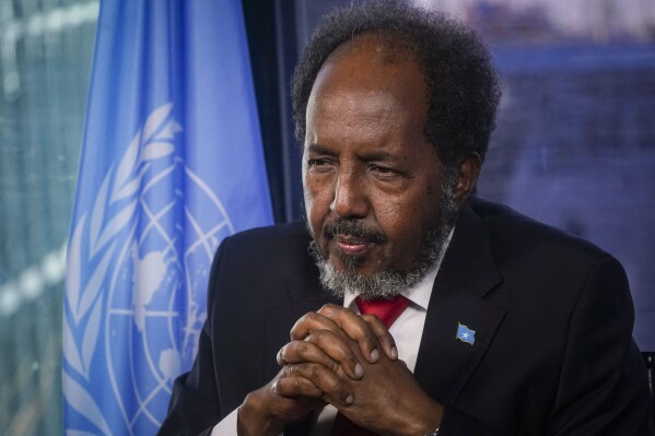 FILE - Somalia's President Hassan Sheikh Mohamud listens during an interview on his visit to the United Nations, Dec. 12, 2023, at U.N. headquarters. Somalia on Wednesday, Dec. 13, secured a $4.5 billion debt relief deal from its international creditors, the International Monetary Fund and World Bank said, which will allow the nation to develop economically and take on new projects. “Somalia’s debt relief process has been nearly a decade of cross governmental efforts spanning three political administrations. This is a testament to our national commitment and prioritization of this crucial and enabling agenda,” said Hassan Sheikh Mohamud. (AP Photo/Bebeto Matthews, File)