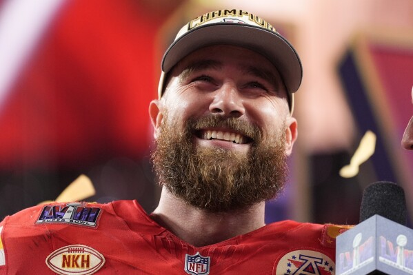 Kansas City Chiefs tight end Travis Kelce (87) celebrates after the NFL Super Bowl 58 football game against the San Francisco 49ers on Sunday, Feb. 11, 2024, in Las Vegas. The Kansas City Chiefs won 25-22 against the San Francisco 49ers. (AP Photo/Ashley Landis)