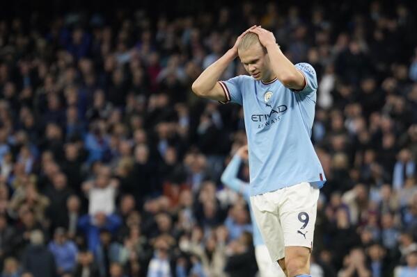 Manchester City's Erling Haaland reacts after Manchester City's Rodrigo missed a scoring chance during the English Premier League soccer match between Manchester City and West Ham United at Etihad stadium in Manchester, England, Wednesday, May 3, 2023. (AP Photo/Dave Thompson)