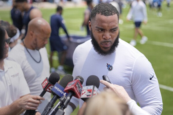 Tennessee Titans defensive tackle Jeffery Simmons speaks during a news conference after practice at NFL football minicamp, Tuesday, June 10, 2025, in Nashville, Tenn. (AP Photo/George Walker IV)