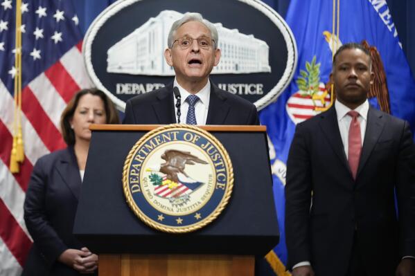 Attorney General Merrick Garland announces a special counsel to oversee the Justice Department's investigation into the presence of classified documents at former President Donald Trump's Florida estate and aspects of a separate probe involving the Jan. 6 insurrection and efforts to undo the 2020 election, at the Justice Department in Washington, Friday, Nov. 18, 2022. At left is Deputy Attorney General Lisa Monaco and Assistant Attorney General for the Criminal Division Kenneth Polite. (AP Photo/Andrew Harnik)