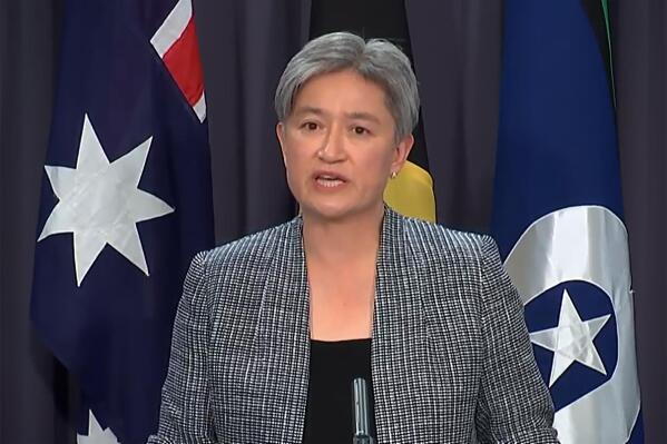 In this image taken from video, Australian Foreign Minister Penny Wong speaks during a press conference, Tuesday, Oct. 18, 2022, in Canberra, Australia. Wong announced Australia has reversed a previous government's recognition of West Jerusalem as Israel's capital. (Australia Pool via AP)
