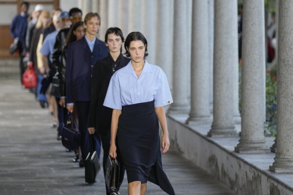Models wear creations as part of the Bally women's Spring Summer 2024 collection presented in Milan, Italy, Saturday, Sept. 23, 2023. (AP Photo/Antonio Calanni)