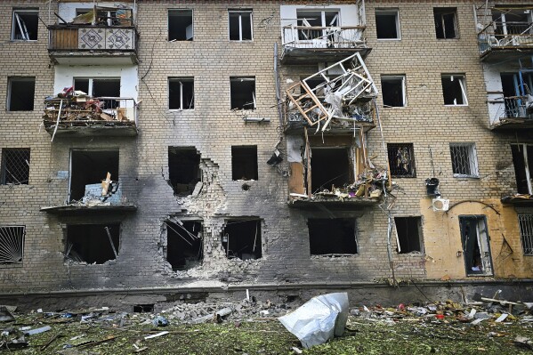 In this photo provided by Kherson Regional Military Administration, a destroyed apartment building is seen at the site of a Russian army attack with guided aerial bombs in Kherson, Ukraine, Thursday, May 15, 2024. (Kherson Regional Military Administration via AP)