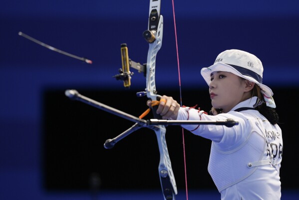 South Korea's Nam Su-hyeon shoots during the women's team quarterfinals competition between at the 2024 Summer Olympics, Sunday, July 28, 2024, in Paris, France. (AP Photo/Rebecca Blackwell)