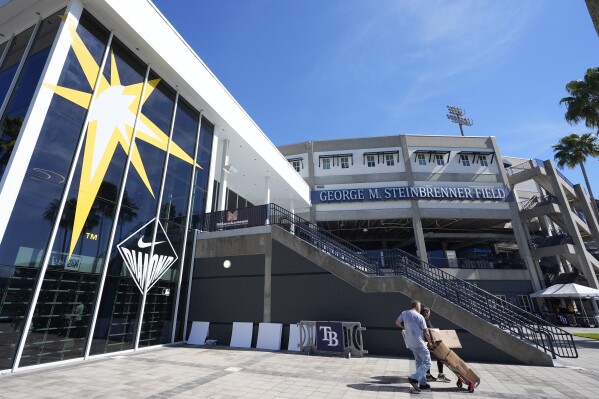 The Tampa Bay Rays logo is shown on the window of the souvenir shop outside George M. Steinbrenner Field during a stadium tour Wednesday, March 26, 2025, in Tampa, Fla. (AP Photo/Chris O'Meara)