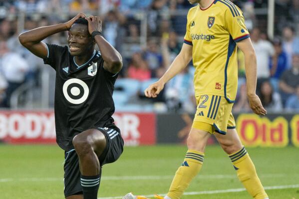 Minnesota United forward Bongokuhle Hlongwane, left, reacts in front of Real Salt Lake defender Andrew Brody (2) after his team narrowly missed a shot-attempt in the first half of an MLS soccer match Saturday, May 27, 2023, in St. Paul, Minn. (Alex Kormann/Star Tribune via AP)