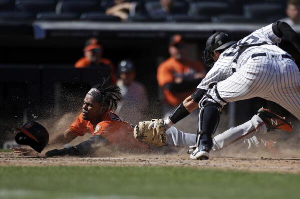 O's rally against Chapman, win after nearly no-hitting Yanks