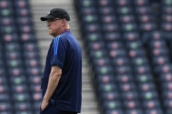 FILE - Sweden's manager Janne Andersson during a training session at the Hampden Park Stadium in Glasgow, on June 28, 2021. Sweden coach Janne Andersson is determined to enjoy his “last night with the gang” before his seven years in charge of the national team comes to an end. The Swedish soccer federation said Andersson would not continue in the role if the team failed to qualify for the European Championship. His fate was sealed when the Swedes lost to Austria last month. (AP Photo/Petr David Josek)