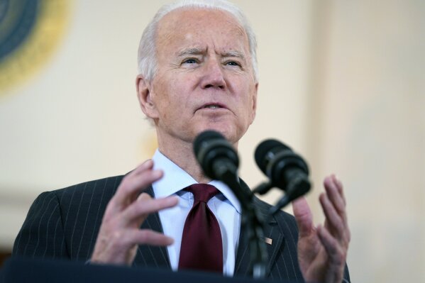 President Joe Biden speaks about the 500,000 Americans that died from COVID-19, Monday, Feb. 22, 2021, in Washington. (AP Photo/Evan Vucci)