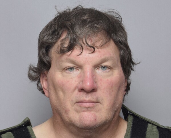 This bookning image provided by Suffolk County Sheriff’s Office, shows Rex Heuermann, a Long Island architect who was charged Friday, July 14, 2023, with murder in the deaths of three of the 11 victims in a long-unsolved string of killings known as the Gilgo Beach murders. (Suffolk County Sheriff’s Office via AP0