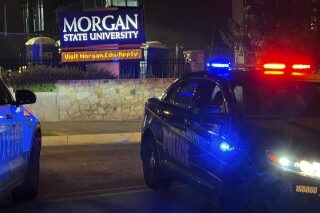 Baltimore police respond to a shooting at Morgan State University, Tuesday, Oct. 3, 2023, in Balitmore. (Jerry Jackson/The Baltimore Sun via AP)