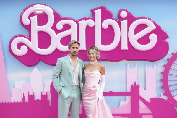 FILE - Ryan Gosling, left, and Margot Robbie pose for photographers upon arrival at the premiere of the film 'Barbie' on July 12, 2023, in London. (Scott Garfitt/Invision/AP, File)