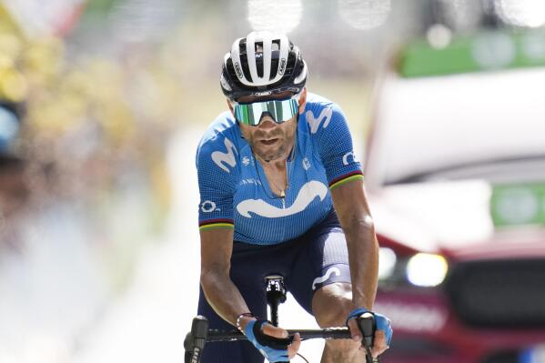 FILE - In this Sunday, July 11, 2021 file photo, Spain's Alejandro Valverde crosses the finish line in second place during the fifteenth stage of the Tour de France cycling race over 191.3 kilometers (118.9 miles) with start in Ceret and finish in Andorra-la-Vella, Andorra. Alejandro Valverde has undergone surgery on his collarbone that he broke during a crash that knocked him out of the Spanish Vuelta, his Movistar team said Saturday Aug. 21, 2021. (AP Photo/Christophe Ena, File)