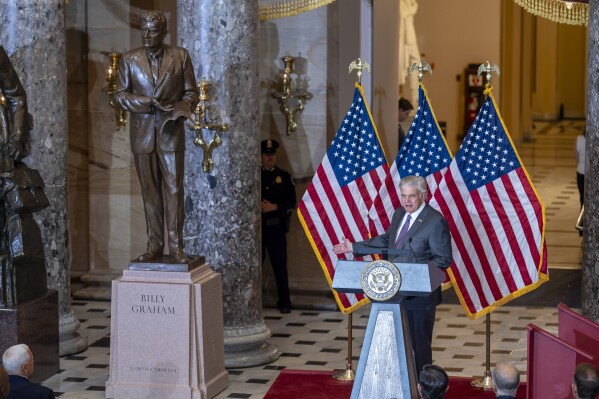 Rev. Franklin Graham, son of the late Rev. Billy Graham, speaks after unveiling a bronzed sculpture of his father at the U.S. Capitol in Washington, where it will stand on behalf of his native North Carolina, Thursday, May 16, 2024. Known as America's pastor, Graham died in 2018 at age 99. (Ǻ Photo/J. Scott Applewhite)