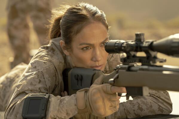 This image released by Netflix shows Jennifer Lopez in a scene from "The Mother." (Ana Carballosa/Netflix via AP)