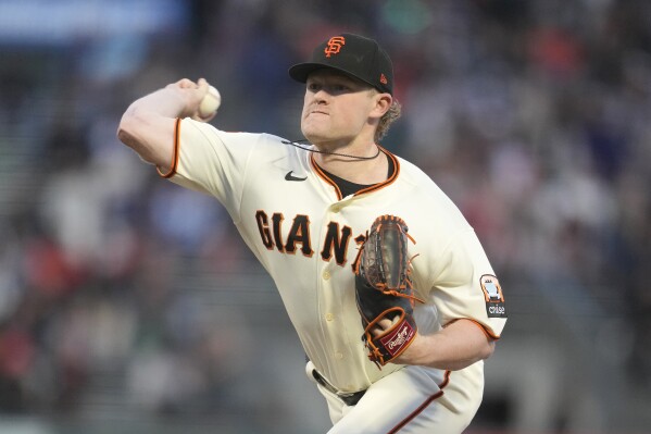 San Francisco Giants pitcher Logan Webb works against the San Diego Padres during the first inning of a baseball game in San Francisco, Monday, Sept. 25, 2023. (AP Photo/Jeff Chiu)