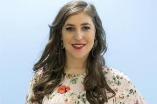 FILE - In this May. 23, 2017 file photo, Mayim Bialik poses for a photo in Los Angeles. "Jeopardy!" is back to guest hosts after the resignation of new host Mike Richards, and actor Mayim Bialik will return as the first. Sony Pictures Television announced Monday that Bialik will take the podium for three weeks of episodes. (AP Photo/Damian Dovarganes)