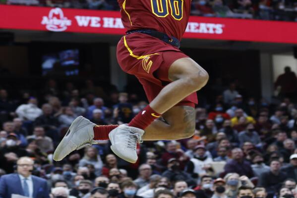 Cleveland Cavaliers' Brandon Goodwin (00) scores against New Orleans Pelicans during the second half of an NBA basketball game, Monday, Jan. 31, 2022, in Cleveland. (AP Photo/Ron Schwane)