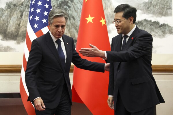 FILE - U.S. Secretary of State Antony Blinken, left, meets with Chinese Foreign Minister Qin Gang, right, at the Diaoyutai State Guesthouse in Beijing, China, on June 18, 2023. China has removed outspoken foreign minister Qin Gang from office and replaced him with his predecessor, Wang Yi. In an announcement on Tuesday, July 25, 2023, state media gave no reason for Qin’s removal, but it comes after he dropped out of sight almost one month ago amid speculation over his personal affairs and political rivalries.(Leah Millis/Pool Photo via AP, File)