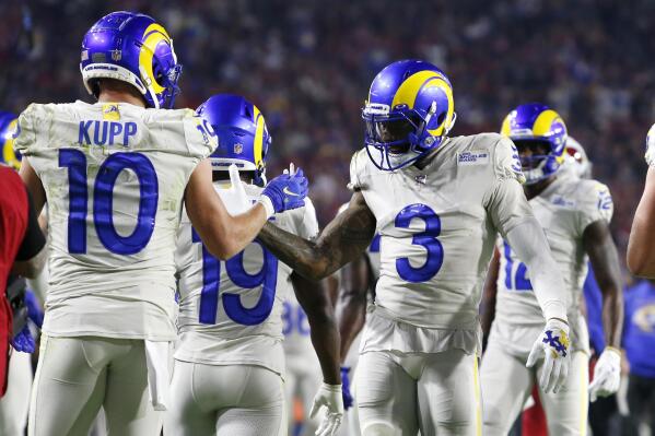 Los Angeles Rams wide receiver Cooper Kupp (10) celebrates his touchdown catch against the Arizona Cardinals with wide receiver Odell Beckham Jr. (3) during the second half of an NFL football game Monday, Dec. 13, 2021, in Glendale, Ariz. (AP Photo/Ralph Freso)
