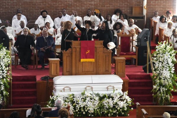Tawanna Brown, from left, Fatima Jones, and Tiffany Summerville appear during a ceremony celebrating the life of Cissy Houston on Thursday, Oct. 17, 2024, at the New Hope Baptist Church in Newark, N.J. (Photo by Charles Sykes/Invision/AP)