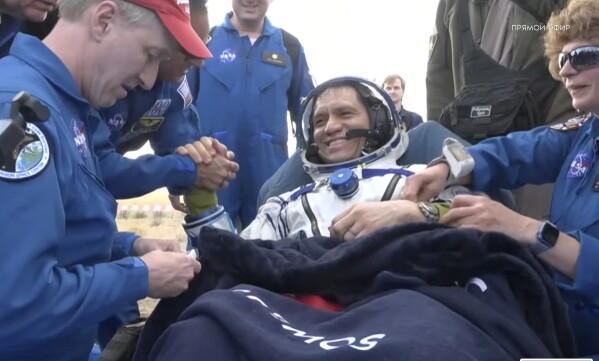 Three astronauts return to Earth after a year in space. NASA's