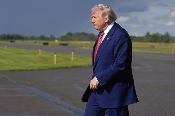 President Donald Trump arrives on Air Force One at Morristown Municipal Airport in Morristown, N.J., Friday, May 23, 2025. (AP Photo/Manuel Balce Ceneta)