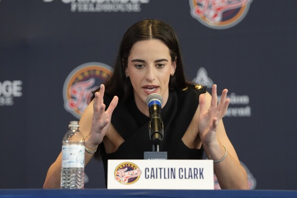 Caitlin Clark looks like a natural as Indiana Fever introduce WNBA's top  draft pick | AP News