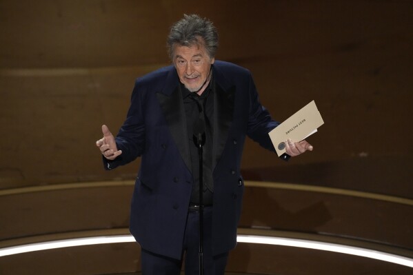 Al Pacino presents the award for best picture during the Oscars on Sunday, March 10, 2024, at the Dolby Theatre in Los Angeles. (AP Photo/Chris Pizzello)