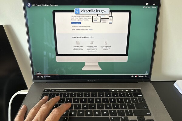 A page from the Internal Revenue Service website is shown on a laptop on Monday, April1, 2024 in New York. Taxpayers usually know their identity has been stolen when they try to file their tax returns and the IRS says they've already done so. (AP Photo/Peter Morgan)