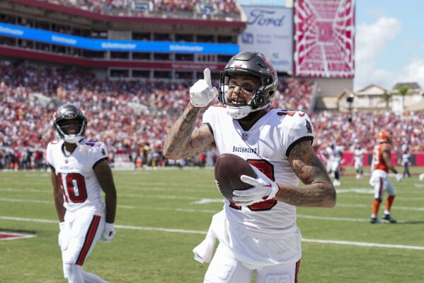 Tampa Bay Buccaneers wide receiver Mike Evans (13) celebrates scoring a touchdown during the second half of an NFL football game against the Chicago Bears, Sunday, Sept. 17, 2023, in Tampa, Fla. (AP Photo/Chris O'Meara)
