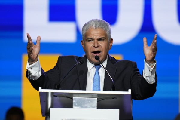 The presidential candidate of Achieving Goals, Jose Raul Mulino, addresses supporters during a campaign rally in Panama City, Sunday, April 28, 2024. Panama will hold general elections on May 5. (AP Photo/Matias Delacroix)