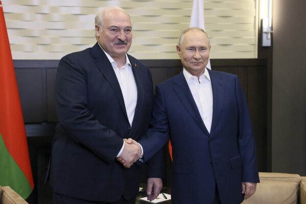 Russian President Vladimir Putin, right, and Belarusian President Alexander Lukashenko shake hands during their meeting in Sochi, Russia, Friday, Sept. 15, 2023. (Mikhail Metzel, Sputnik, Kremlin Pool Photo via AP)