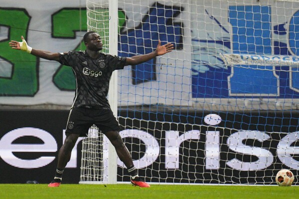 FILE - Ajax's Brian Brobbey celebrates after scoring his side's second goal during the Europa League Group B soccer match between Olympique de Marseille and Ajax at the Velodrome Stadium, in Marseille, France, Thursday, Nov. 30, 2023. Few aficionados in European soccer obsess about numbers the way the Dutch do. (AP Photo/Daniel Cole, File)