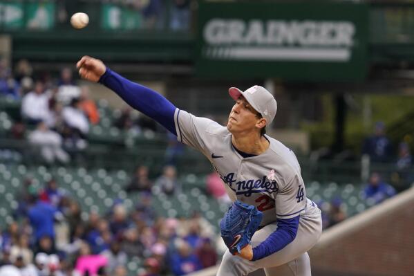 Los Angeles Dodgers starting pitcher Walker Buehler throws against the Chicago Cubs during the first inning of a baseball game in Chicago, Sunday, May 8, 2022. (AP Photo/Nam Y. Huh)