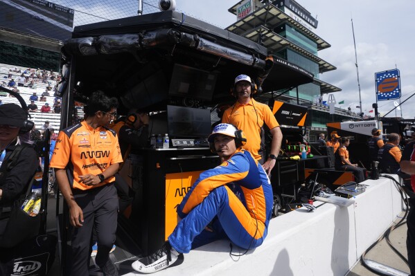 Kyle Larson sits on pit wall during a practice session for the Indianapolis 500 auto race at Indianapolis Motor Speedway, Friday, May 17, 2024, in Indianapolis. (AP Photo/Darron Cummings)
