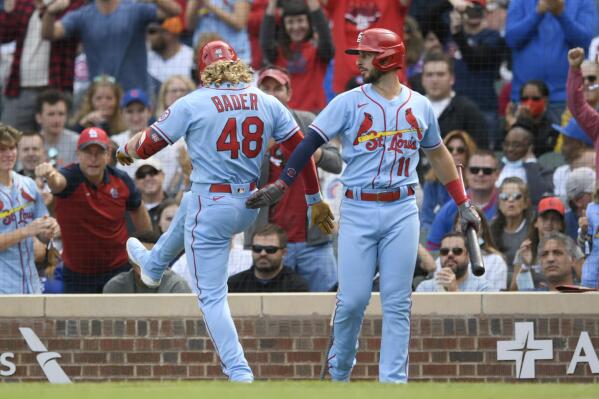 St. Louis Cardinals' Harrison Bader (48) celebrates with teammate Paul DeJong (11) after hitting a solo home run during the second inning of a baseball game against the Chicago Cubs Saturday, Sept. 25, 2021, in Chicago. (AP Photo/Paul Beaty)