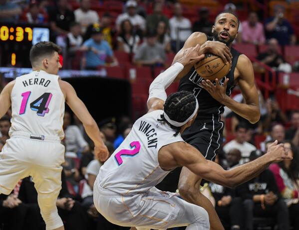 Nets win first over Heat