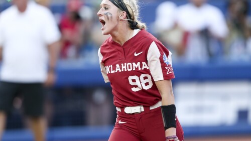 FILE - Oklahoma pitcher Jordy Bahl (98) yells after striking out a Texas batter to end an inning during the second game of the NCAA softball Women's College World Series finals in Oklahoma City, Okla., Thursday, June 9, 2022. Former Oklahoma softball star Jordy Bahl has returned to her home state to play for Nebraska. (Ian Maule/Tulsa World via AP, File)/Tulsa World via AP)