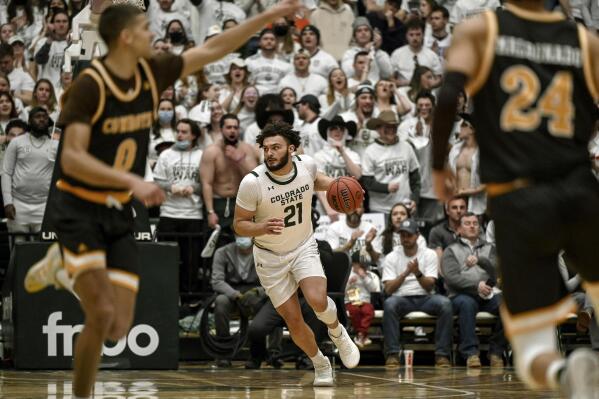 Colorado State's David Roddy (21) runs in transition during the first half of an NCAA college basketball game against Wyoming Wednesday, Feb. 23, 2022 in Fort Collins, Colo. (AAron Ontiveroz/The Denver Post via AP)