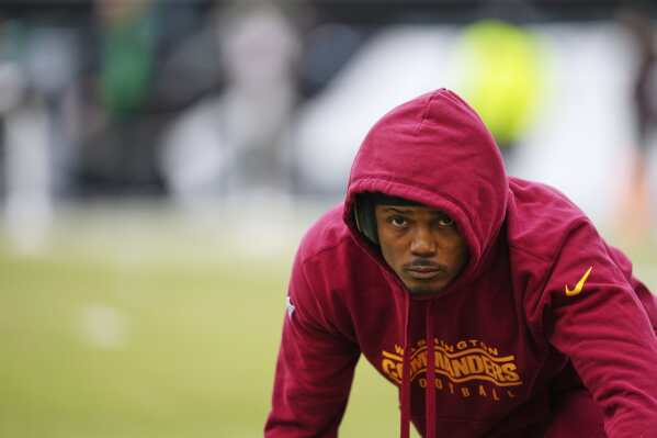 Washington Commanders wide receiver Terry McLaurin warms up before the NFC Championship NFL football game Jan. 26, 2025, in Philadelphia. (AP Photo/Derik Hamilton, File)