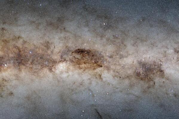 This image made available by the National Science Foundation's NOIRLab in January 2023 shows the galactic plane of the Milky Way galaxy. Astronomers have captured more than 3 billion stars and galaxies in one of the biggest sky surveys ever, focusing on the Southern Hemisphere sky. (DECaPS2/DOE/FNAL/DECam/CTIO/NOIRLab/NSF/AURA, M. Zamani & D. de Martin via AP)