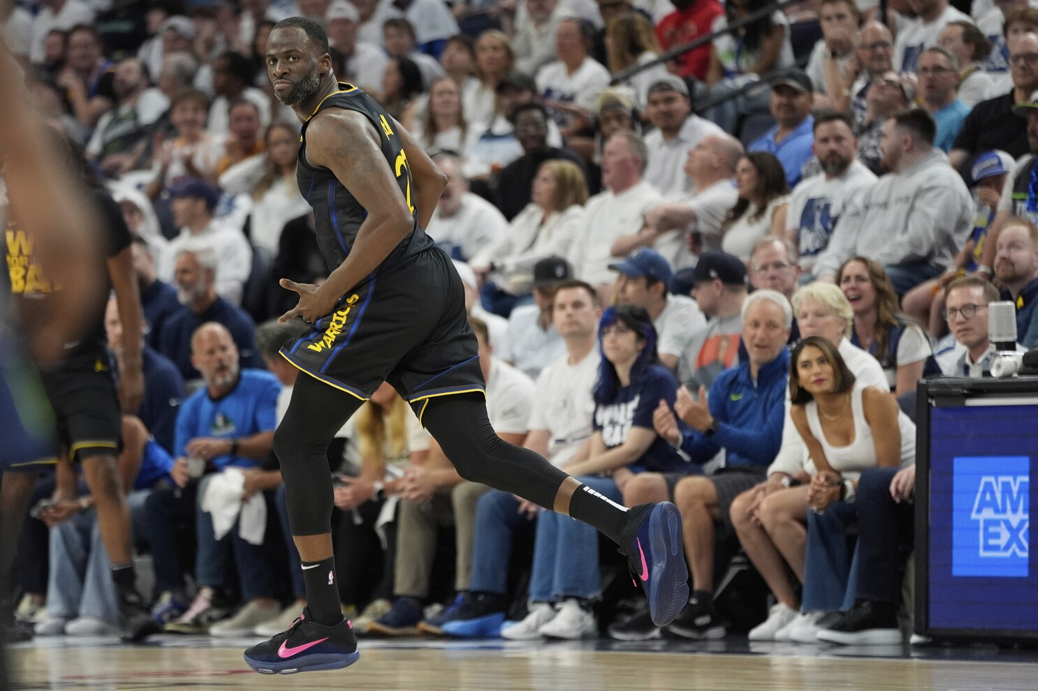 Warriors take Game 1 from cold-shooting Wolves 99-88 despite Curry's departure with hamstring strain