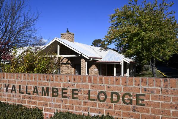The entrance to the aged care facility Yallambee Lodge in Cooma, Australia is photographed on Friday, May 19, 2023. A 95-year-old woman is in hospital in a critical condition after she was shot with a stun gun in an Australian nursing home as she approached police with a walking frame and a steak knife. (Lukas Coch/AAP Image via AP)