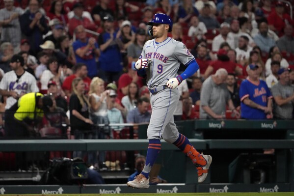 New York Mets' Brandon Nimmo rounds the bases after hitting a solo home run during the seventh inning of a baseball game against the St. Louis Cardinals Monday, May 6, 2024, in St. Louis. (AP Photo/Jeff Roberson)
